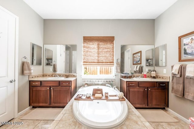 9800 Hafflinger Ln, Reno, NV 89521 - full bathroom featuring two vanities, a bath, and tile patterned floors