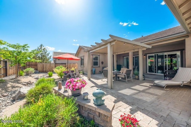 9800 Hafflinger Ln, Reno, NV 89521 - fenced backyard with a patio area and outdoor dining space