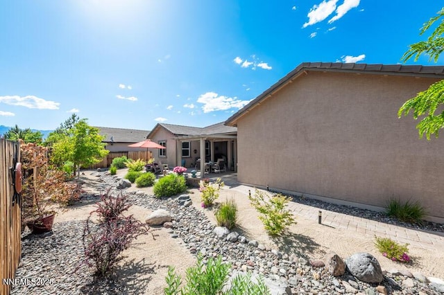 9800 Hafflinger Ln, Reno, NV 89521 - fenced backyard featuring a patio