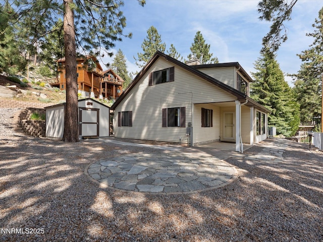 605 Jerry Dr, Zephyr Cove, NV 89448 - back of property with a patio area