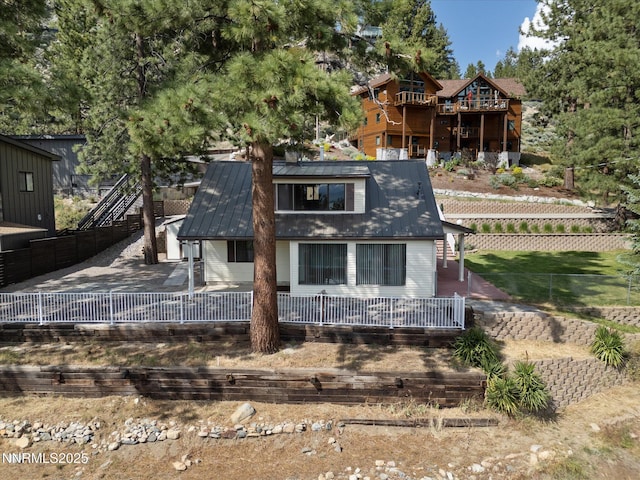 605 Jerry Dr, Zephyr Cove, NV 89448 - view of front of property featuring a fenced backyard and metal roof