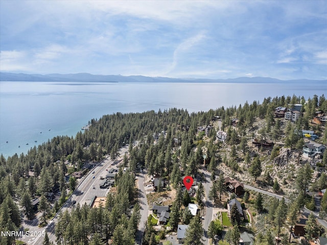 605 Jerry Dr, Zephyr Cove, NV 89448 - aerial view of property and surrounding area with a water and mountain view and a heavily wooded area