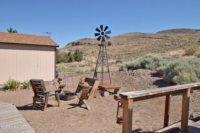 35 Count Fleet Ct, Reno, NV 89502 - view of yard with a mountain view and an outdoor fire pit