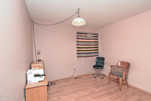 35 Count Fleet Ct, Reno, NV 89502 - unfurnished room with wood finished floors and a textured ceiling