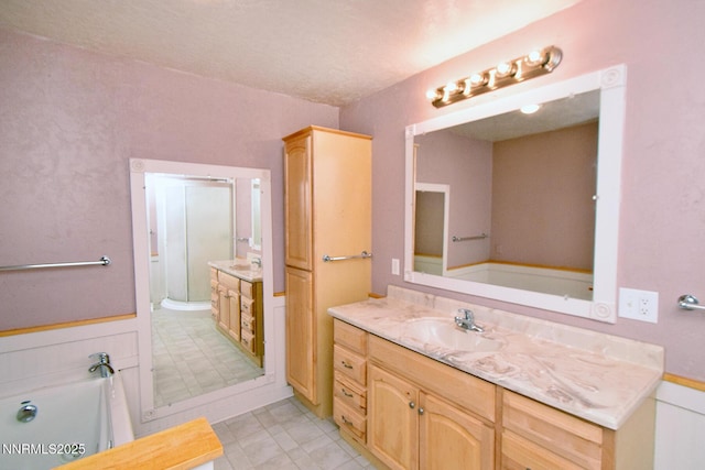 35 Count Fleet Ct, Reno, NV 89502 - bathroom featuring vanity, a shower stall, and a garden tub