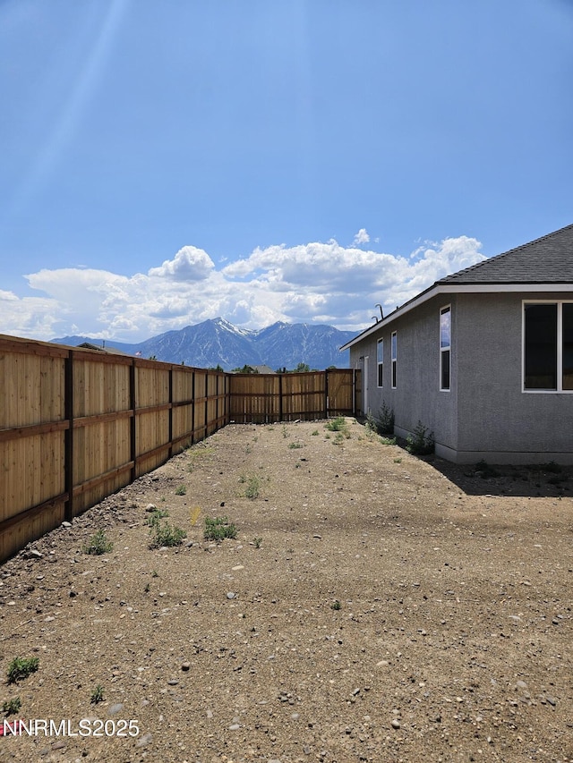 1224 Heybourne Rd, Gardnerville, NV 89410 - fenced backyard featuring a mountain view