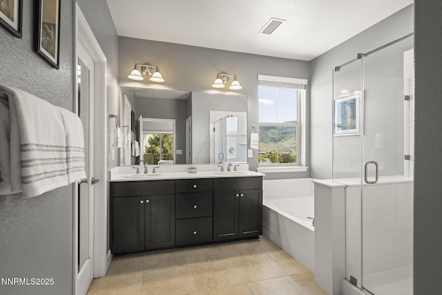 1775 Samantha Crest Trl, Reno, NV 89523 - full bath featuring a shower stall, a bath, double vanity, and tile patterned floors