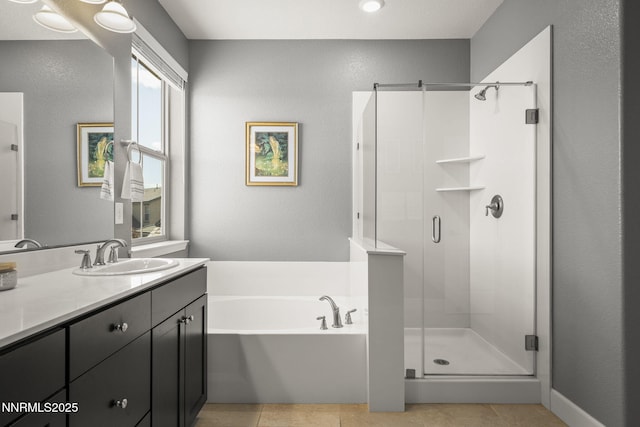 1775 Samantha Crest Trl, Reno, NV 89523 - bathroom with a stall shower, vanity, a bath, and tile patterned floors