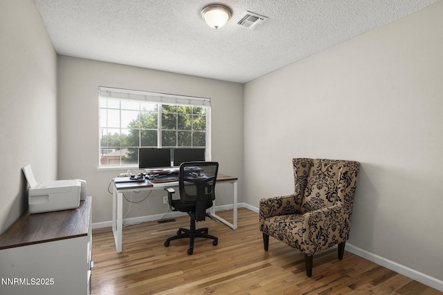 3505 Everett Dr, Reno, NV 89503 - office area with wood finished floors and a textured ceiling