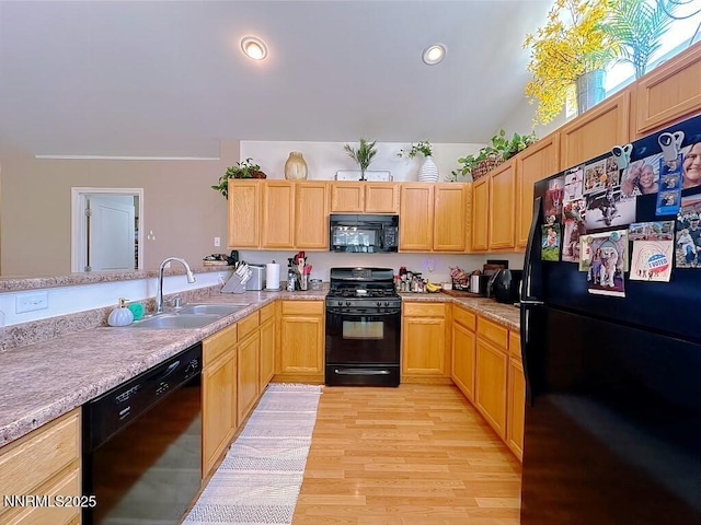 2657 Elizabeth Pkwy, Fallon, NV 89406 - kitchen featuring black appliances, a sink, light brown cabinetry, light countertops, and recessed lighting