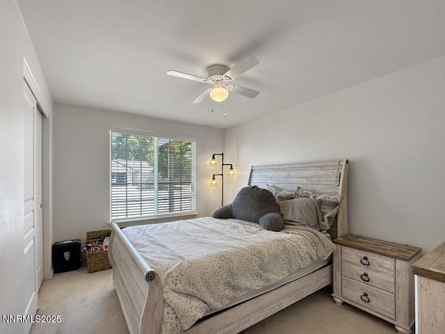 2657 Elizabeth Pkwy, Fallon, NV 89406 - bedroom with light carpet, a closet, and a ceiling fan