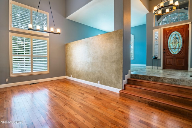 1500 Backer Way, Reno, NV 89523 - foyer with a chandelier, a towering ceiling, and hardwood / wood-style floors