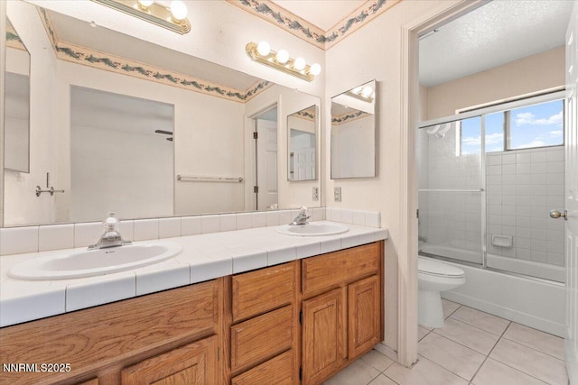 1372 Laser Ct, Sparks, NV 89436 - full bathroom with double vanity, tile patterned flooring, and enclosed tub / shower combo