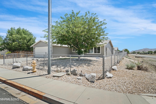 1000 Dwight Way, Dayton, NV 89403 - view of front of property featuring a fenced front yard and concrete driveway