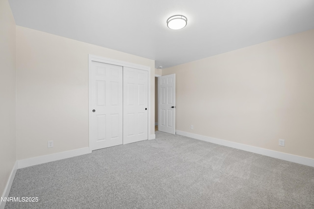 1000 Dwight Way, Dayton, NV 89403 - unfurnished bedroom with carpet, a closet, and baseboards