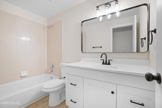 1000 Dwight Way, Dayton, NV 89403 - bathroom featuring vanity, washtub / shower combination, wood finished floors, and toilet