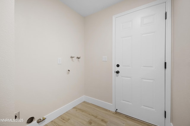 1000 Dwight Way, Dayton, NV 89403 - laundry area with gas dryer hookup, light wood-style floors, baseboards, and hookup for a washing machine