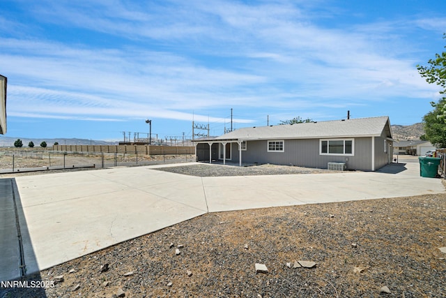 1000 Dwight Way, Dayton, NV 89403 - rear view of property with a patio and cooling unit