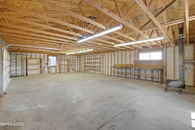 1000 Dwight Way, Dayton, NV 89403 - garage with a wood stove