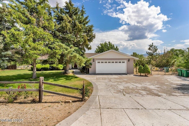1809 Franklin Rd, Carson City, NV 89706 - view of front of property featuring driveway, an attached garage, and stucco siding