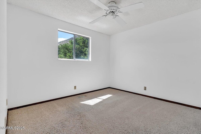 1809 Franklin Rd, Carson City, NV 89706 - unfurnished room with carpet flooring, a textured ceiling, baseboards, and ceiling fan