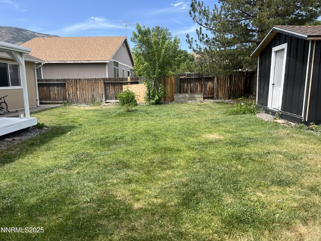 7785 Crystal Shores Dr, Reno, NV 89506 - fenced backyard with a shed