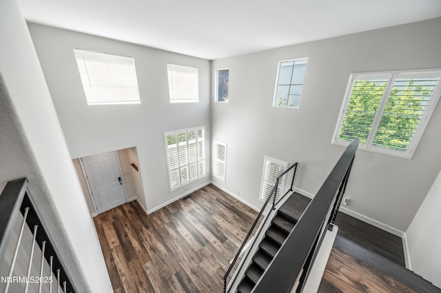 2978 Fox Trail Dr, Reno, NV 89523 - staircase with wood finished floors and a high ceiling