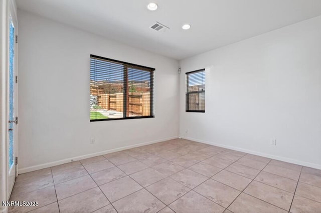 14373 Fredonia Dr, Reno, NV 89506 - unfurnished room featuring light tile patterned flooring and recessed lighting