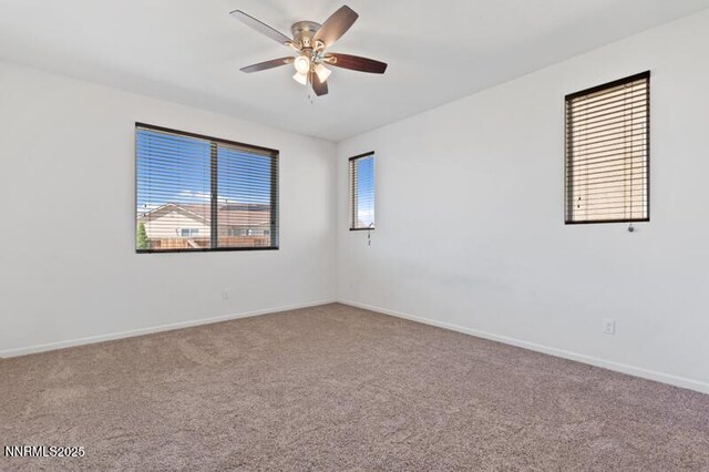 14373 Fredonia Dr, Reno, NV 89506 - carpeted empty room featuring ceiling fan and baseboards