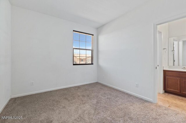 14373 Fredonia Dr, Reno, NV 89506 - unfurnished room with light colored carpet and baseboards