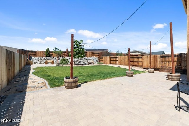 14373 Fredonia Dr, Reno, NV 89506 - fenced backyard featuring a patio