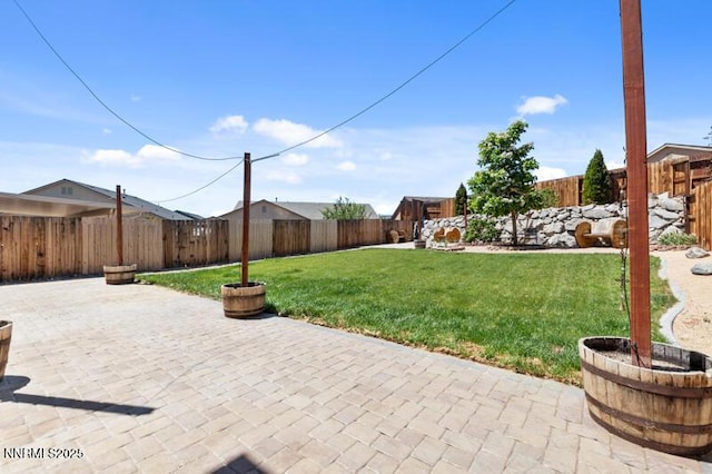 14373 Fredonia Dr, Reno, NV 89506 - fenced backyard featuring a patio