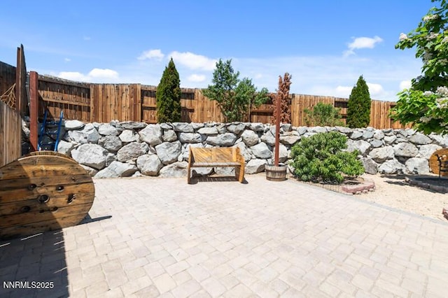 14373 Fredonia Dr, Reno, NV 89506 - fenced backyard featuring a patio area
