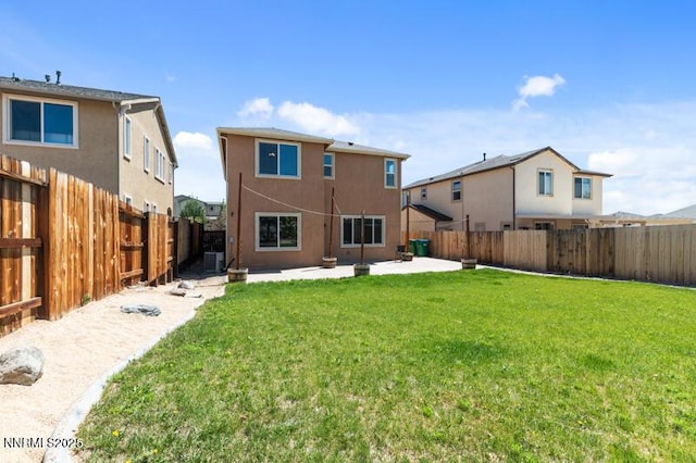 14373 Fredonia Dr, Reno, NV 89506 - rear view of property with stucco siding, a patio, and a fenced backyard