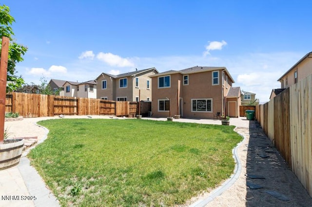 14373 Fredonia Dr, Reno, NV 89506 - back of house with stucco siding, a residential view, a fenced backyard, and a patio