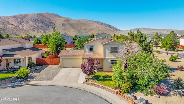 17705 Oakview Ct, Reno, NV 89508 - view of front of house with driveway, a garage, a mountain view, and a residential view