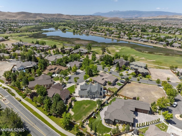 3128 Wild Iris Ct, Sparks, NV 89436 - aerial overview of property's location featuring a water and mountain view, nearby suburban area, and a golf course