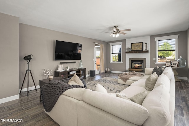 3128 Wild Iris Ct, Sparks, NV 89436 - living room with ceiling fan, dark wood-style floors, and a large fireplace