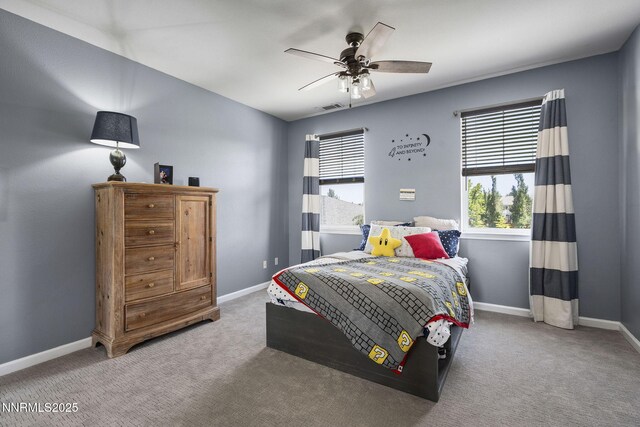 3128 Wild Iris Ct, Sparks, NV 89436 - bedroom featuring multiple windows, carpet floors, and ceiling fan