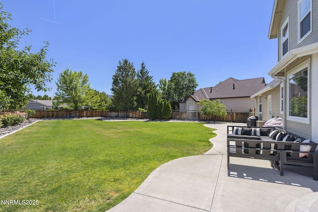 3128 Wild Iris Ct, Sparks, NV 89436 - fenced backyard with outdoor lounge area and a patio area