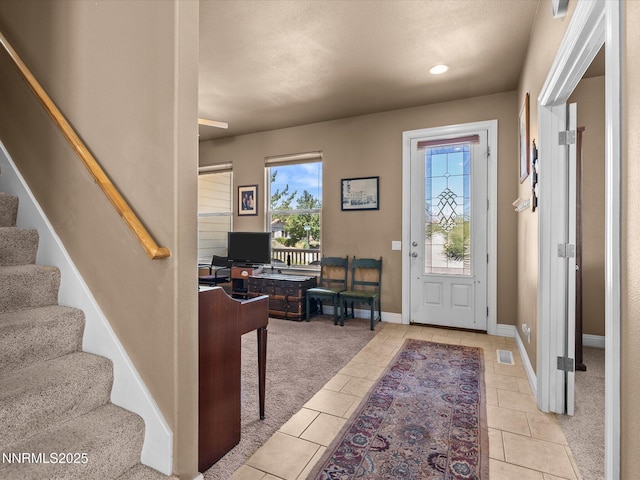 4903 Killdeer Rd, Carson City, NV 89701 - entryway with plenty of natural light, stairway, and recessed lighting
