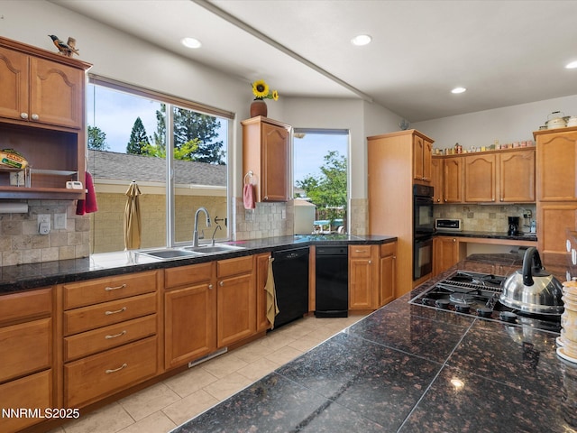 4903 Killdeer Rd, Carson City, NV 89701 - kitchen with black appliances, healthy amount of natural light, backsplash, tile counters, and recessed lighting