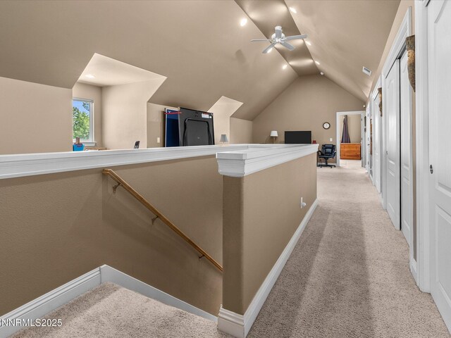 4903 Killdeer Rd, Carson City, NV 89701 - corridor with lofted ceiling, a desk, and light carpet