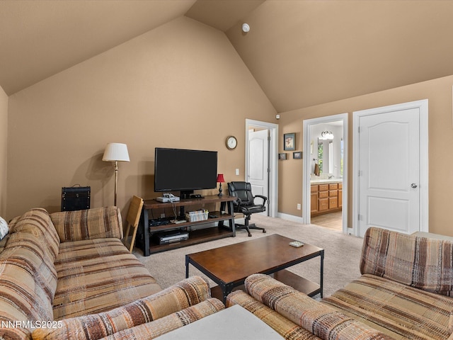 4903 Killdeer Rd, Carson City, NV 89701 - living room featuring light carpet, high vaulted ceiling, and an office area