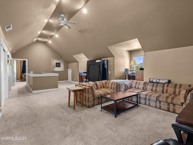 4903 Killdeer Rd, Carson City, NV 89701 - living area featuring lofted ceiling, a ceiling fan, and light carpet