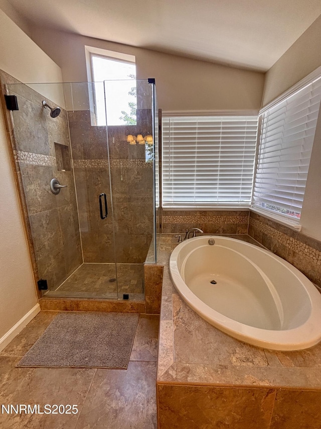 3882 Streamside Ct, Reno, NV 89519 - bathroom featuring a bath and a shower stall