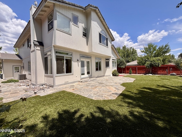 3882 Streamside Ct, Reno, NV 89519 - back of property featuring french doors, a patio, and a chimney