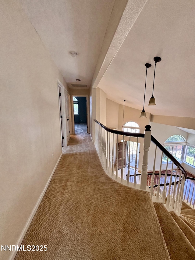3882 Streamside Ct, Reno, NV 89519 - hallway with carpet floors and healthy amount of natural light