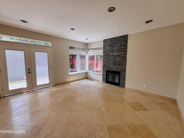 3882 Streamside Ct, Reno, NV 89519 - unfurnished living room featuring a fireplace, french doors, and light tile patterned floors