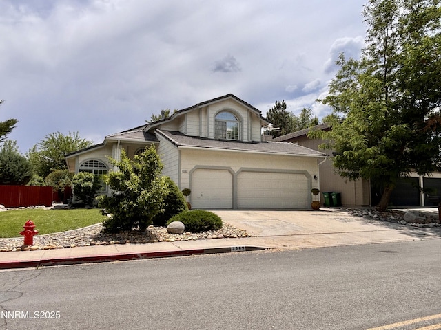 3882 Streamside Ct, Reno, NV 89519 - view of front of home with driveway and an attached garage